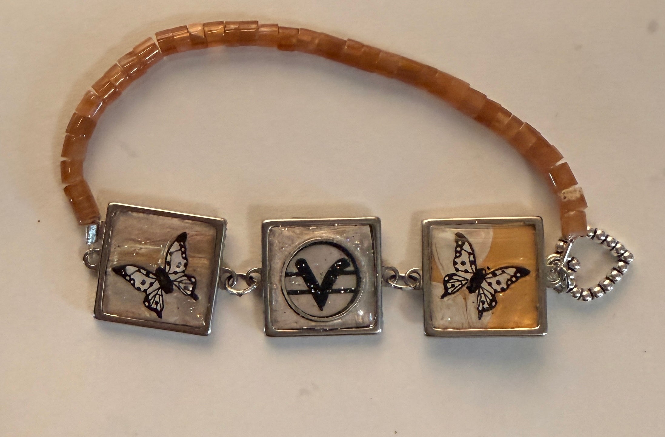 Blue SOM Teaching symbol bracelet with butterflies